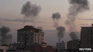 Smoke rises following Israeli air strikes in Gaza City