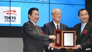 Japan Airlines president Yoshiharu Ueki, chairman Kazuo Inamori and chairman Masaru Onishi