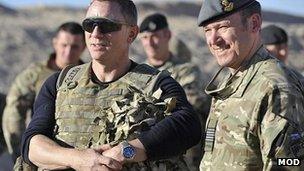Daniel Craig (l) at Camp Bastion