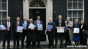 (l-r) Dean Gilligan (Save our Hospitals Ealing) Julian Bell (leader, Ealing Council) Andy Slaughter (MP for Hammersmith), Virendra Sharma (MP for Ealing Southall) Onkar Sahota (Chair SoH Ealing) Steve Pound (MP for Ealing North) Carlo Nero (Chair, SoH Hammersmith & Fulham) Colin Standfield (Save Our Hospitals Ealing), Anne Drinkell (Save Our Hospitals Hammersmith & Fulham) Dede Wilson (Save Our Hospitals Hammersmith & Fulham)