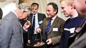 Prince Charles sniffing chocolate