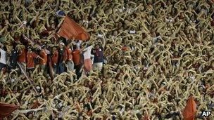 Fans cheer during an Independiente match on 1 November