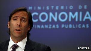 Economy Minister Hernan Lorenzino at a press conference on 22 November 2012