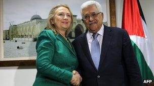 US Secretary of State Hillary Clinton shakes hands with Palestinian President Mahmoud Abbas