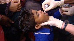 Child receiving polio vaccine