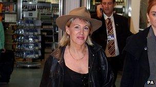 Nadine Dorries arrives at Heathrow