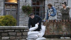 Man and sandbags