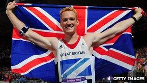 Greg Rutherford celebrates winning gold at London 2012