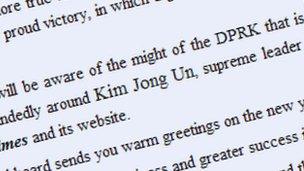 Enlarged Kim Jong Un in text