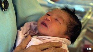 A newborn baby in a hospital in Singapore in 2004