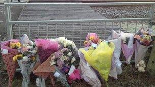 Floral tributes at the scene of the accident