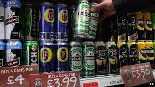 Cans of beer at supermarket