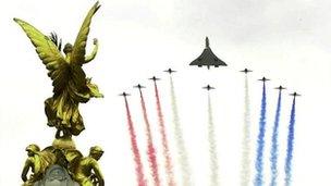 The Red Arrows and Concorde flying over the Queen Victoria memorial outside the front of Buckingham Palace, bringing celebrations for Queen Elizabeth II golden jubilee to a close in June 2002