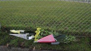 Bouquets of flowers at the Buitenboys club in tribute to linesman Richard Nieuwenhuizen