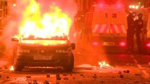 Car on fire during protest