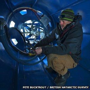 Attaching the water hose inside the umbilical hose reeler