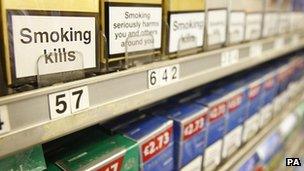 Cigarettes displayed in cabinet