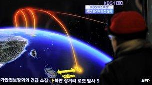 A man in Seoul watches South Korea's TV report on North Korea's rocket launch. Photo: 12 December 2012