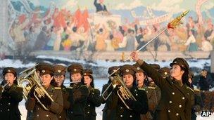 Female members of a North Korean military band perform in celebration of the country's rocket launch in Pyongyang, North Korea, 12 December 2012