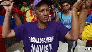 Supporters of Venezuelan President Hugo Chavez prayed during a mass in Caracas on December 11, 2012.