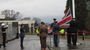 Union jack being lowered at GCHQ Oakley