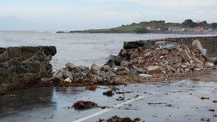 Damage to the road and sea wall at Perelle in Guernsey