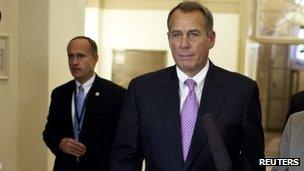 House Speaker John Boehner returns from talks at the White House 17 December 2012