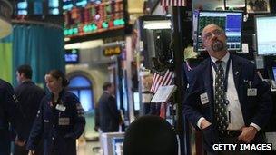 Traders on the floor of the New York Stock Exchange