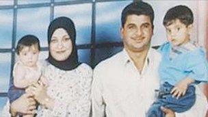 Baha Mousa with his wife and children