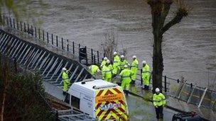 Workers erect defences at Ironbridge, Shropshire