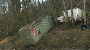 Container and white van caught in landslip