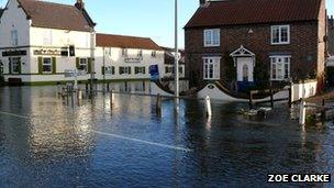 Flooded street at Burton Fleming