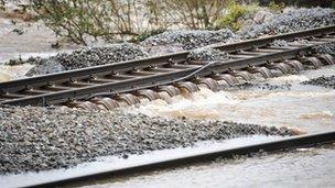 Flood damage at Cowley Bridge