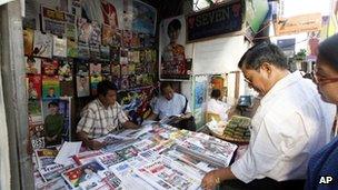 Burmese people buying newspapers on 28 December 2012