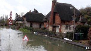 A flooded road in Clifton Hampden in Oxfordshire on 28 December