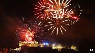 Fireworks go off over Edinburgh Castle as part of the new year 2013 Edinburgh Hogmanay celebrations in Scotland