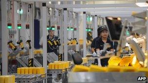 A worker in a factory in Singapore