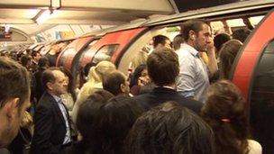 People struggling to get on a Central Line train on Tuesday morning