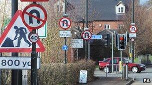 Road signs on the A419 in Gloucestershire