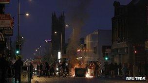 Loyalist youths burn debris in the Newtownards Road