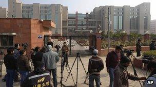 Television crew take positions in front of the Saket district court where the accused in a gang rape are being tried, in New Delhi, India, Monday, Jan. 7, 2013.