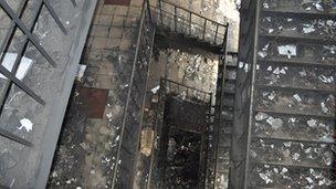 Shattered glass on stairways of the factory