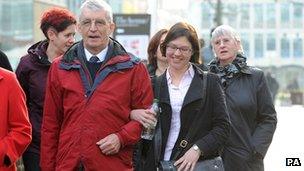 Michael Brewer with Hilary (far right) arriving at Manchester Crown Court