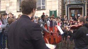 Young musicians in concert outside Newport council offices