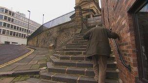 Mark Holdstock on steps by home