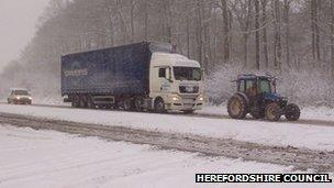 Tractor helping an HGV at Dinmore Hill on the A49 in Herefordshire