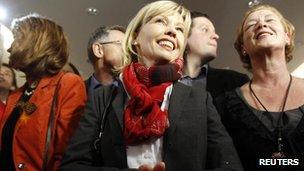 Doris Schroeder-Koepf (C) candidate of the Social Democrats (SPD) reacts after first exit polls for the Lower Saxony federal state election in Hanover on 20 January.