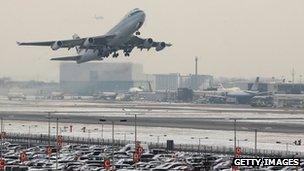 Flight taking off in snow at Heathrow