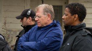 Robert Zemeckis and Denzel Washington on the set of Flight. Copyright Paramount Pictures.