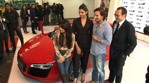 Indian movie stars at the launch of an Audi car